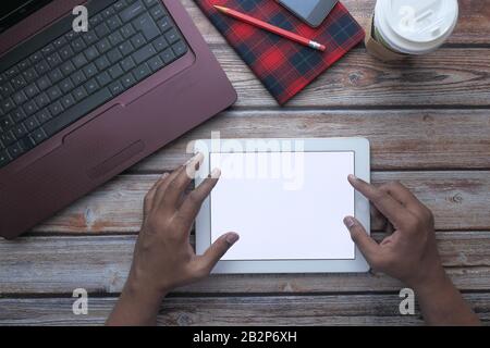 top view of man hand use digital tablet on office desk  Stock Photo