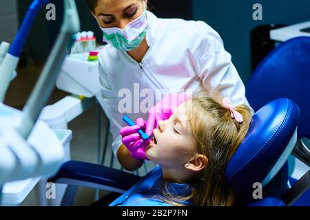 The little patient at the dentist's office Stock Photo