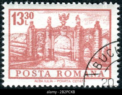 ROMANIA - CIRCA 1972: A stamp printed in Romania, depicted city gate in Alba Iulia, circa 1972 Stock Photo