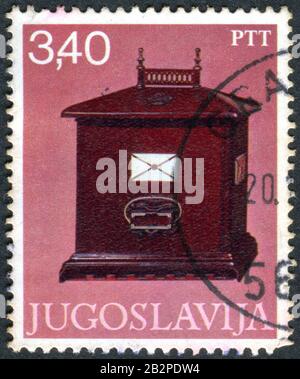 YUGOSLAVIA - CIRCA 1978: A stamp printed in Yugoslavia, depicted Letter-box, 1840, circa 1978 Stock Photo