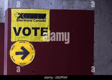 Elections Canada “VOTE” signs posted on a building near Toronto  City, seen during the 2019 Canada Federal Election. Stock Photo