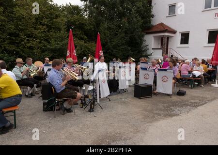 Ochsle, Germany - 13 sep. 2015: Local festival with parade of fanfare and people dressed in traditonal costumes. Every village from the neighbourhoud Stock Photo