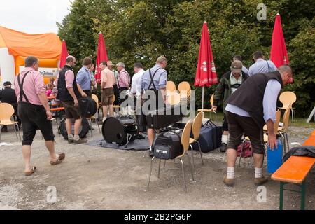 Ochsle, Germany - 13 sep. 2015: Local festival with parade of fanfare and people dressed in traditonal costumes. Every village from the neighbourhoud Stock Photo