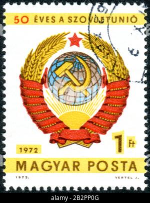 HUNGARY - CIRCA 1972: A stamp printed in Hungary, dedicated to the 50th anniversary of Soviet Union, depicted the Coat of Arms, circa 1972 Stock Photo