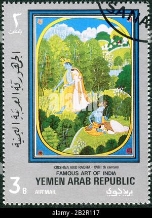 YEMEN - CIRCA 1971: A stamp printed in Yemen, dedicated to the famous art of India, depicts the picture Krishna and Radha, 18th century, circa 1971 Stock Photo