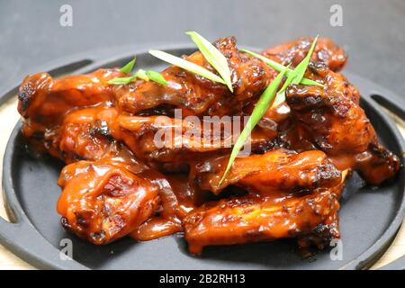 buffalo chicken wings on a plate Stock Photo