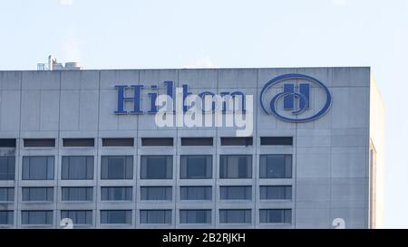 Hilton Hotels sign atop of their hotel in downtown Toronto. Stock Photo