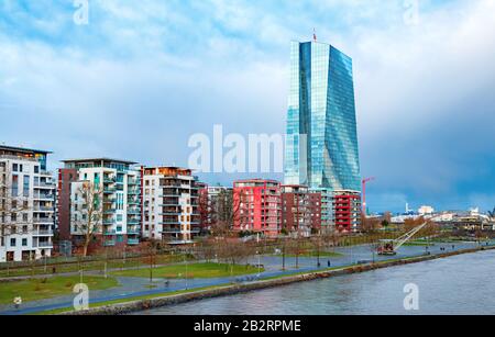 European Central Bank (ECB) headquarters building and residential buildings along the river Main. Frankfurt am Main, Germany. Stock Photo