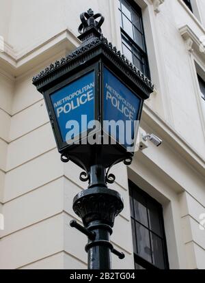 Metropolitan Police blue lamp outside Charing Cross Metropolitan Police station, London, England, UK Stock Photo