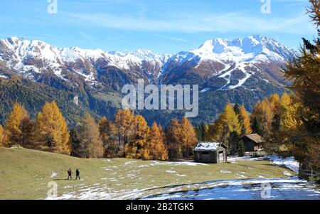 Hiker, autumn atmosphere in the Virgen Valley, Zedlach, Matrei, East Tyrol, Austria Stock Photo