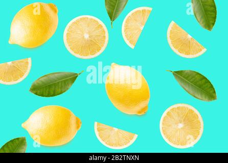 pattern with lemon slices and leaves on a light blue background. Stock Photo