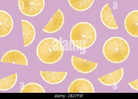 pattern with lemon slices on a purple background. Stock Photo