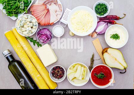Easter bunny (rabbit) and chicken eggs children (kids) food concept. With carrot on rosy (pink) plate. Wooden background, top view. Stock Photo