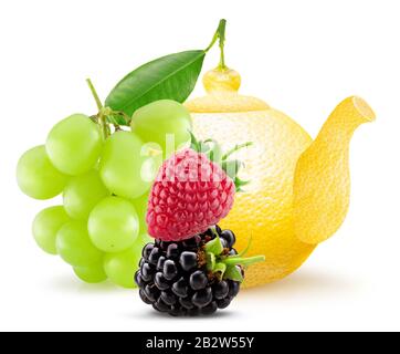 lemon shape teapot with green grapes, strawberry and blackberry isolated on a white background. Stock Photo