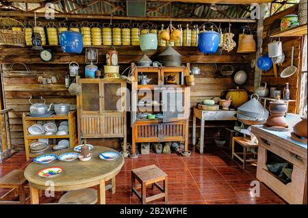 Thai kitchen interior in the countryside showing various types of utensils and equipment, and how they are arranged and stored. Stock Photo