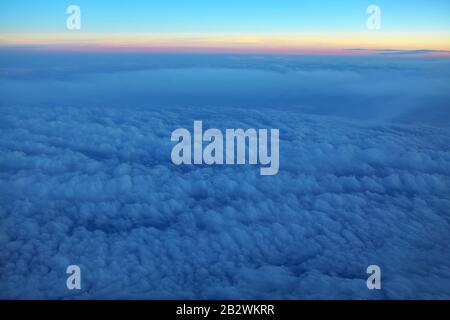 fluffy clouds background in the evening Stock Photo