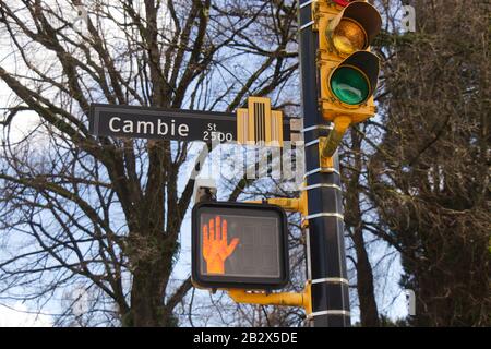 Vancouver, Canada - February 17, 2020: A view of traffic lights on Cambie Street in Downtown Vancouver. Stock Photo