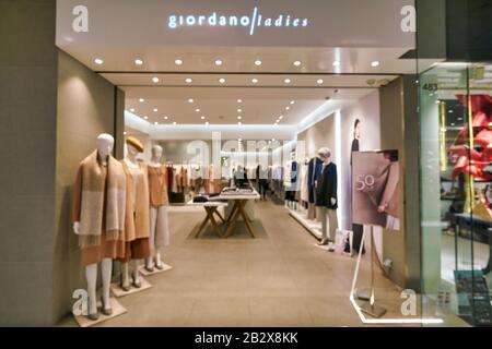 HONG KONG, CHINA - JANUARY 23, 2019: defocused shot of entrance Giordano Ladies storefront in New Town Plaza. New Town Plaza is a shopping mall in the Stock Photo