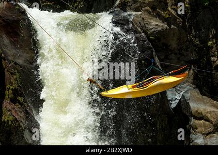 Kayak Swinging On A Ziplin Extreme Sport Theme Stock Photo