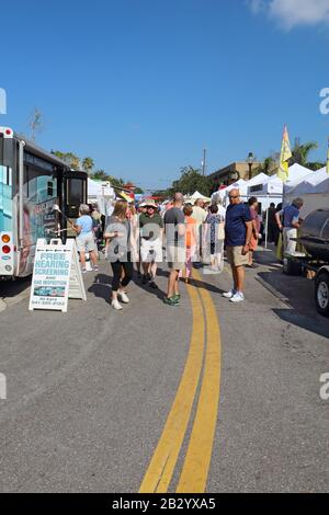 Vendors and shoppers at the Sarasota Farmers Market in fall. This vibrant event occurs downtown on Lemon Avenue Stock Photo