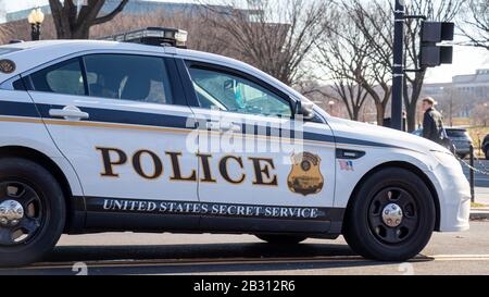 United States Secret Service (USSS) Uniformed Division patrol car sitting at the entrance to The Eclipse park in-front of The White House. Stock Photo