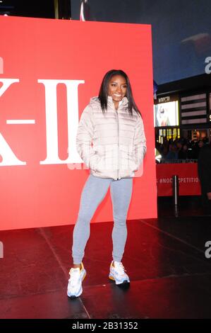 New York City, United States. 04th Mar, 2020. Olympic gymnast Simone Biles takes over Times Square to promote her skincare brand SK-II in New York City. Credit: SOPA Images Limited/Alamy Live News Stock Photo