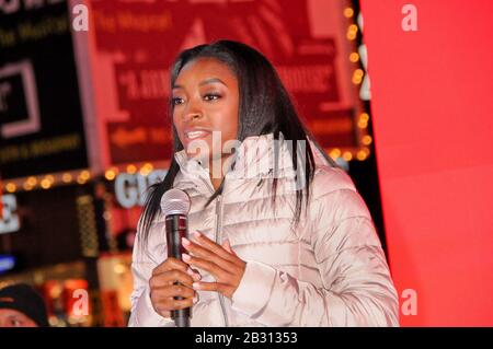 New York City, United States. 04th Mar, 2020. Olympic gymnast Simone Biles takes over Times Square to promote her skincare brand SK-II in New York City. Credit: SOPA Images Limited/Alamy Live News Stock Photo