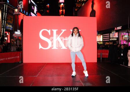 New York City, United States. 04th Mar, 2020. Olympic gymnast Simone Biles takes over Times Square to promote her skincare brand SK-II in New York City. Credit: SOPA Images Limited/Alamy Live News Stock Photo