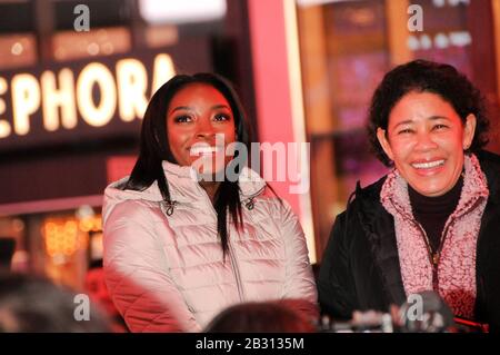 New York City, United States. 04th Mar, 2020. Olympic gymnast Simone Biles takes over Times Square to promote her skincare brand SK-II in New York City. Credit: SOPA Images Limited/Alamy Live News Stock Photo