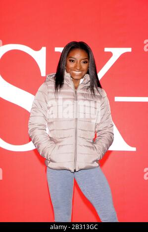 New York City, United States. 04th Mar, 2020. Olympic gymnast Simone Biles takes over Times Square to promote her skincare brand SK-II in New York City. Credit: SOPA Images Limited/Alamy Live News Stock Photo