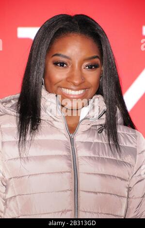 New York City, United States. 04th Mar, 2020. Olympic gymnast Simone Biles takes over Times Square to promote her skincare brand SK-II in New York City. Credit: SOPA Images Limited/Alamy Live News Stock Photo