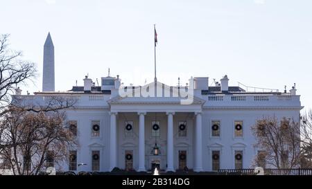 The White House, north side seen on a bright afternoon with the Washington Monument in the background. Stock Photo