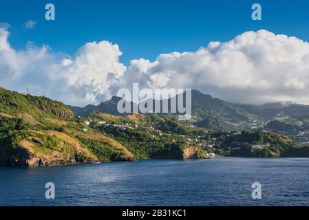 Coastline view with lots of living houses on the hill in Clare Valley, Kingstown, Saint Vincent island, Saint Vincent and the Grenadines Stock Photo