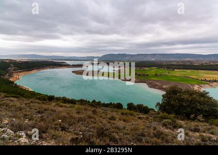 Buendia reservoir with turquoise waters in spring. La Alcarria region, Spain Stock Photo