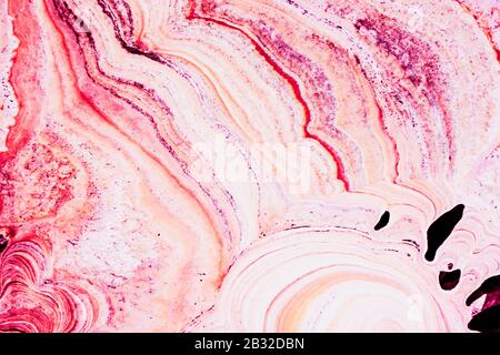 Marble nature texture made as if performed by fluid art technique. The drawing includes swirls of marble. Agate ripple pattern.  Stock Photo