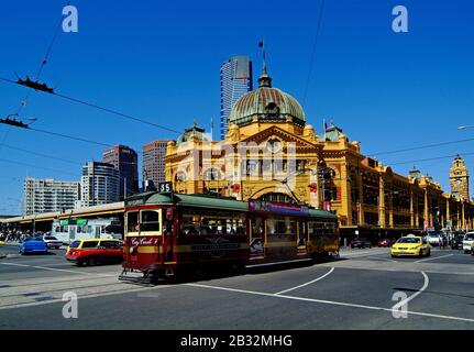 Melbourne, Australia - November 09, 2006: Unidentified people, traffic and City Circle Tram in front of Flinders Street Station Stock Photo