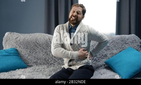 Man suffering from back pain Stock Photo