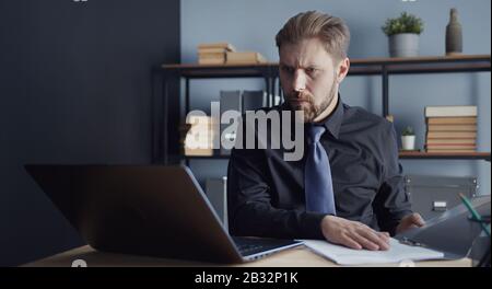 Man working in office Stock Photo