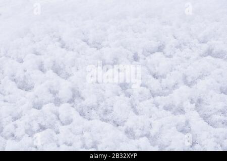Winter texture of white fluffy snow covered surface. White fresh snow background Stock Photo