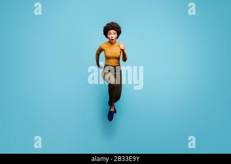 Full length body size view of her she nice girlish funky worried active wavy-haired girl running late on-time isolated on bright vivid shine vibrant Stock Photo