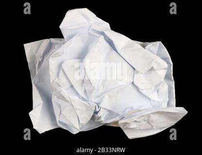 Crumpled A4 white sheet  for Christmas gifts snd decorations.  Night macro on a black background. Stock Photo