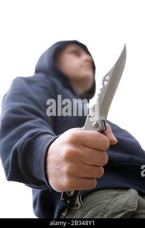 Youth with knife UK. Posed by model Stock Photo