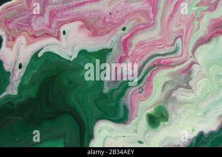 Closeup shot of abstract patterns created with bright paints mixed in the water Stock Photo