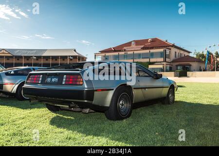 Adelaide, Australia - October 19, 2013: DeLorean DMC-12 cars parked on the green oval after an American cars street cruise on a day Stock Photo