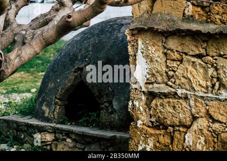 Paphos Cyprus March 03, 2020 View of an old abandoned house being destroyed on the streets of Paphos in the afternoon Stock Photo