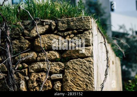 Paphos Cyprus March 03, 2020 View of an old abandoned house being destroyed on the streets of Paphos in the afternoon Stock Photo