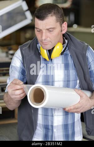 engineer works in printing industry Stock Photo