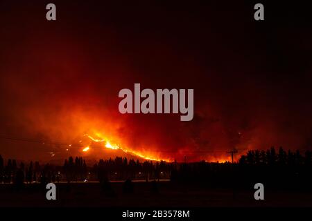 Night view of wildfires occurred in Esquel, Patagonia, Argentina on March 3 2020 Stock Photo