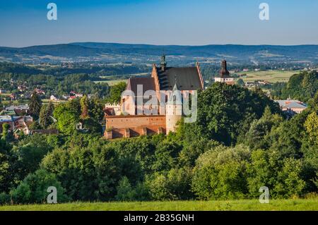 View of town of Biecz, Church of Corpus Christi, 1326, in center, Ropa River Valley, Malopolska, Poland Stock Photo