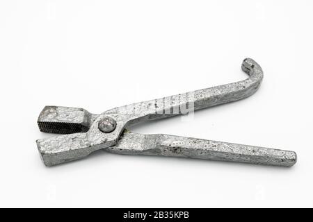 Plyers isolated on white background, rusty plier head Stock Photo